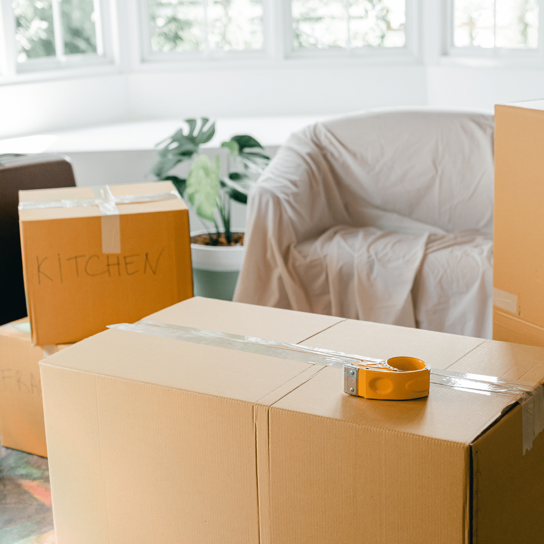 All Ways Moving crew professionally packing boxes during a residential move