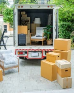 Family unpacking holiday decorations with All Ways Moving, Jacksonville, NC